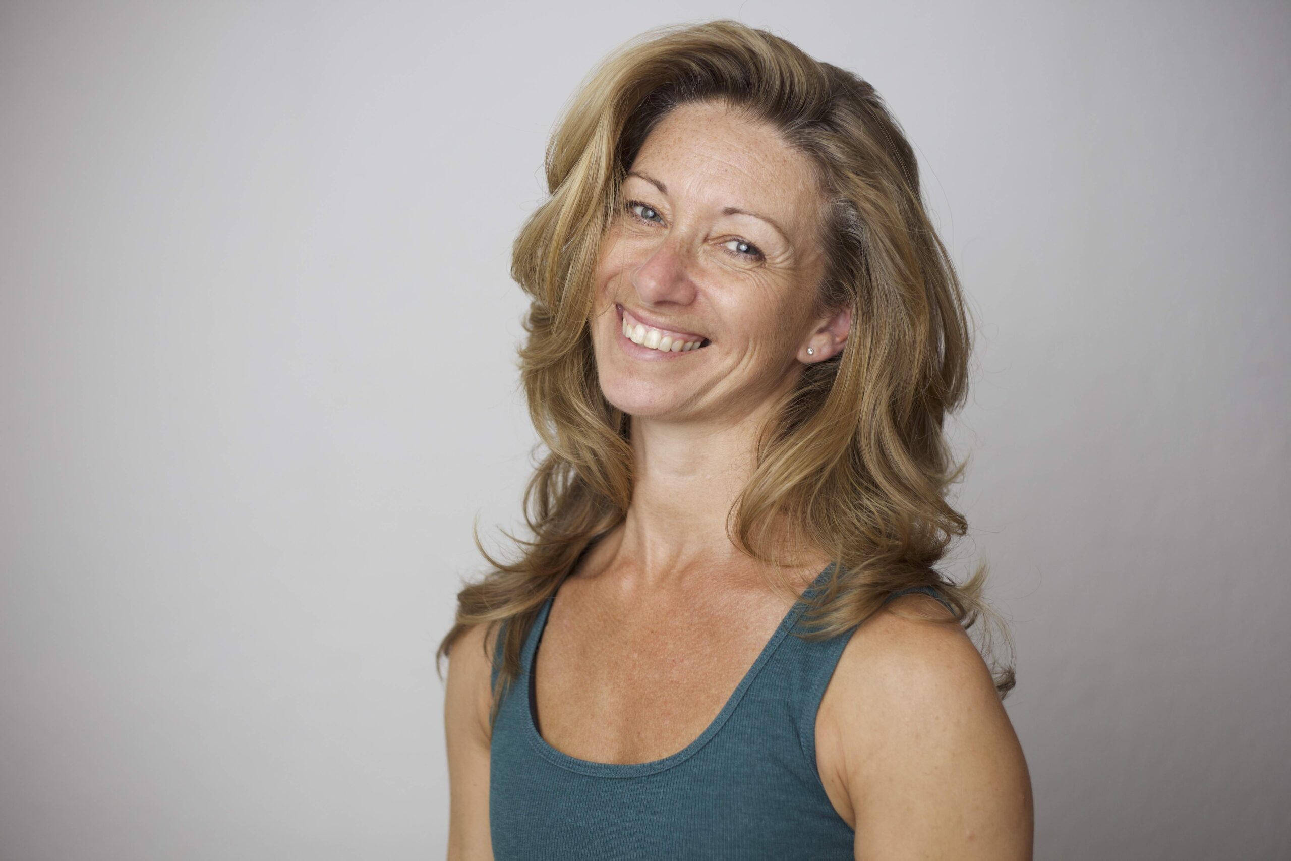 Julie Selwood, Scolio-Pilates Principal Educator serving France, Germany, and Switzerland, smiling in a professional portrait