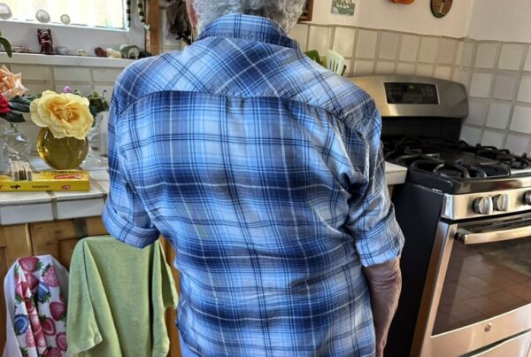 An adult practicing scoliosis-specific exercise