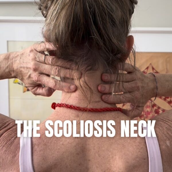back of woman's neck with fingers on neck