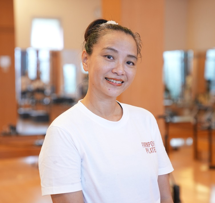 Diana Embran, Authorized Scolio-Pilates practitioner in Jakarta, Indonesia, smiling in her studio