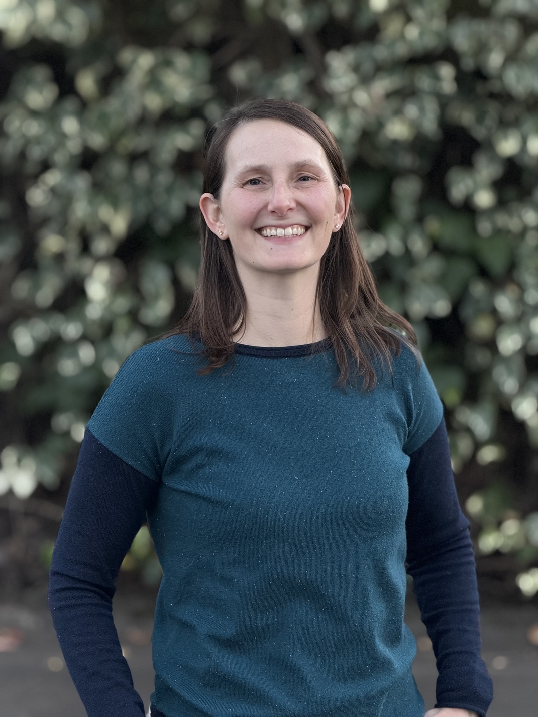 Elyse McCluskey, Authorized Scolio-Pilates practitioner in Santa Rosa, California, smiling outdoors