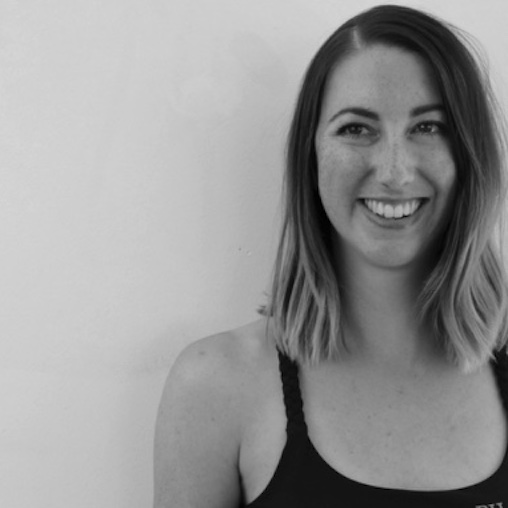 Frances Cahill, Authorized Scolio-Pilates practitioner in Perth, Western Australia, smiling in a black and white portrait