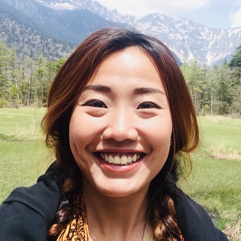Grace Tanuwidjaja, Authorized Scolio-Pilates practitioner in Surabaya, East Java, Indonesia, smiling outdoors