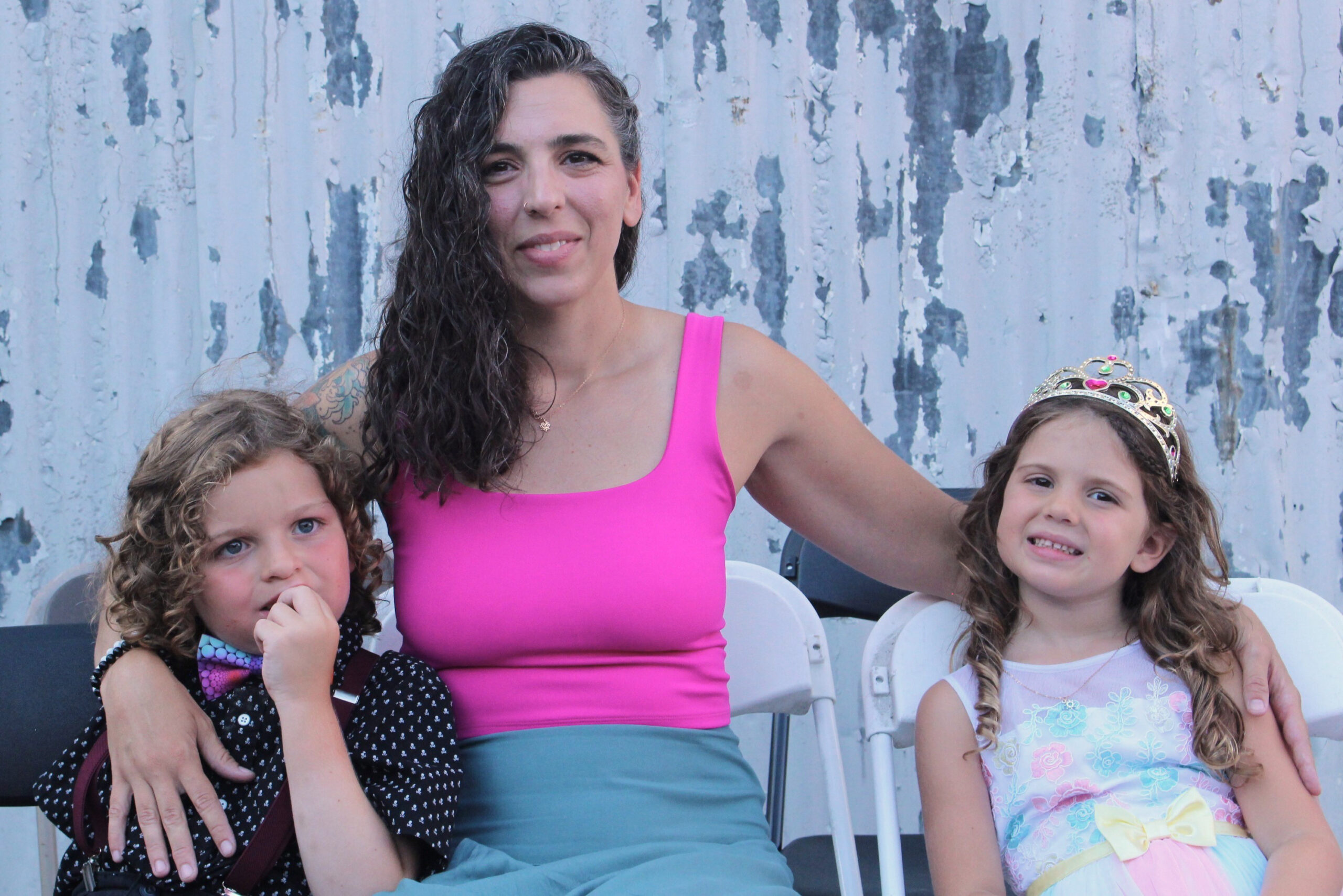 Christina Upchurch, Authorized Scolio-Pilates practitioner serving Washington and Oregon, smiling outdoors with her children