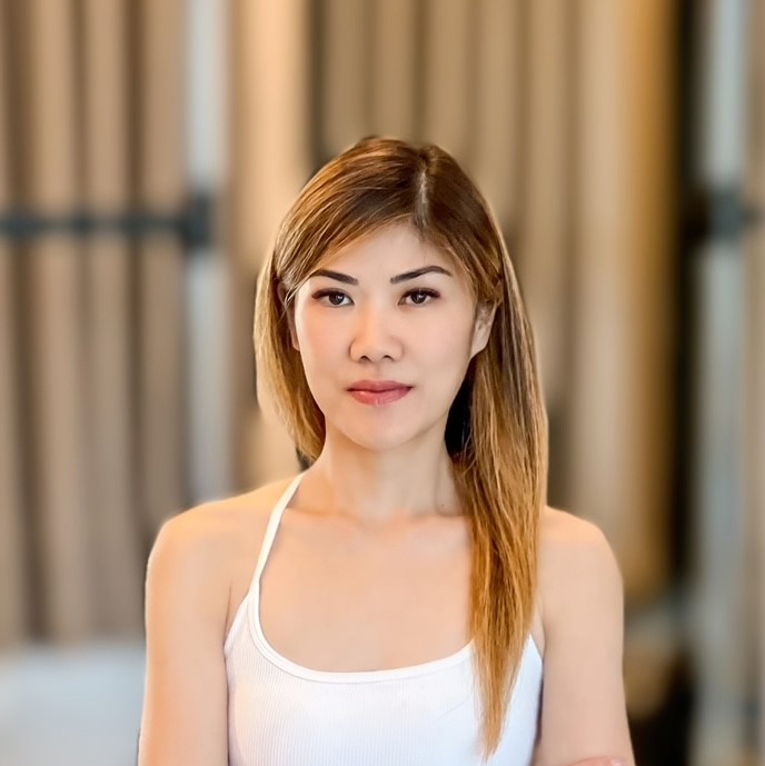 Marcella Tedja, Authorized Scolio-Pilates practitioner in Denpasar, Bali, Indonesia, smiling in a professional portrait