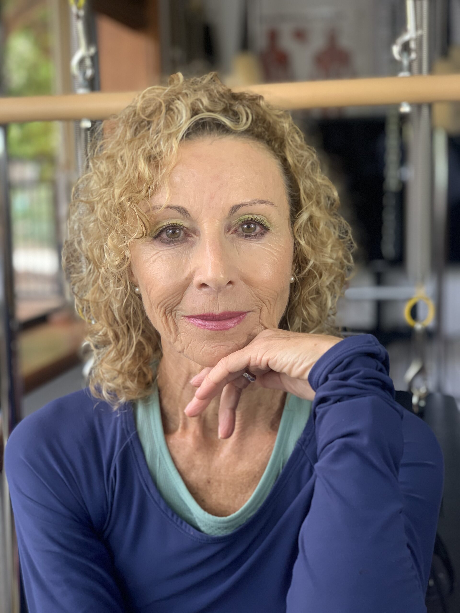 Montse, Authorized Scolio-Pilates practitioner serving Vigo, Pontevedra and Madrid, Spain, professional portrait in her studio