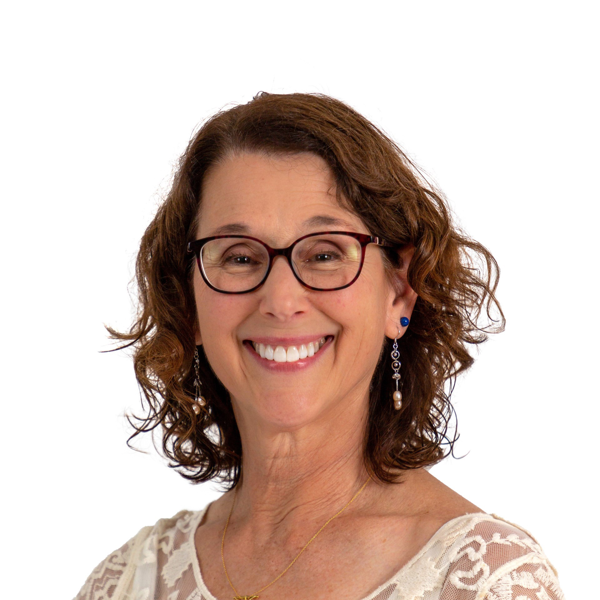 Suzanne Koucheravy, Scolio-Pilates educator and practitioner in Alexandria and Falls Church, Virginia, smiling in a professional portrait