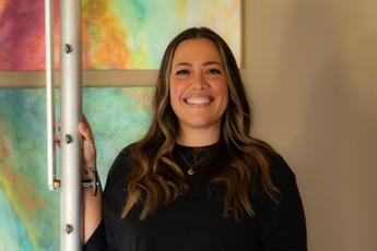 Tiffany Henry, Authorized Scolio-Pilates practitioner in Santa Clarita, California, smiling in a professional portrait